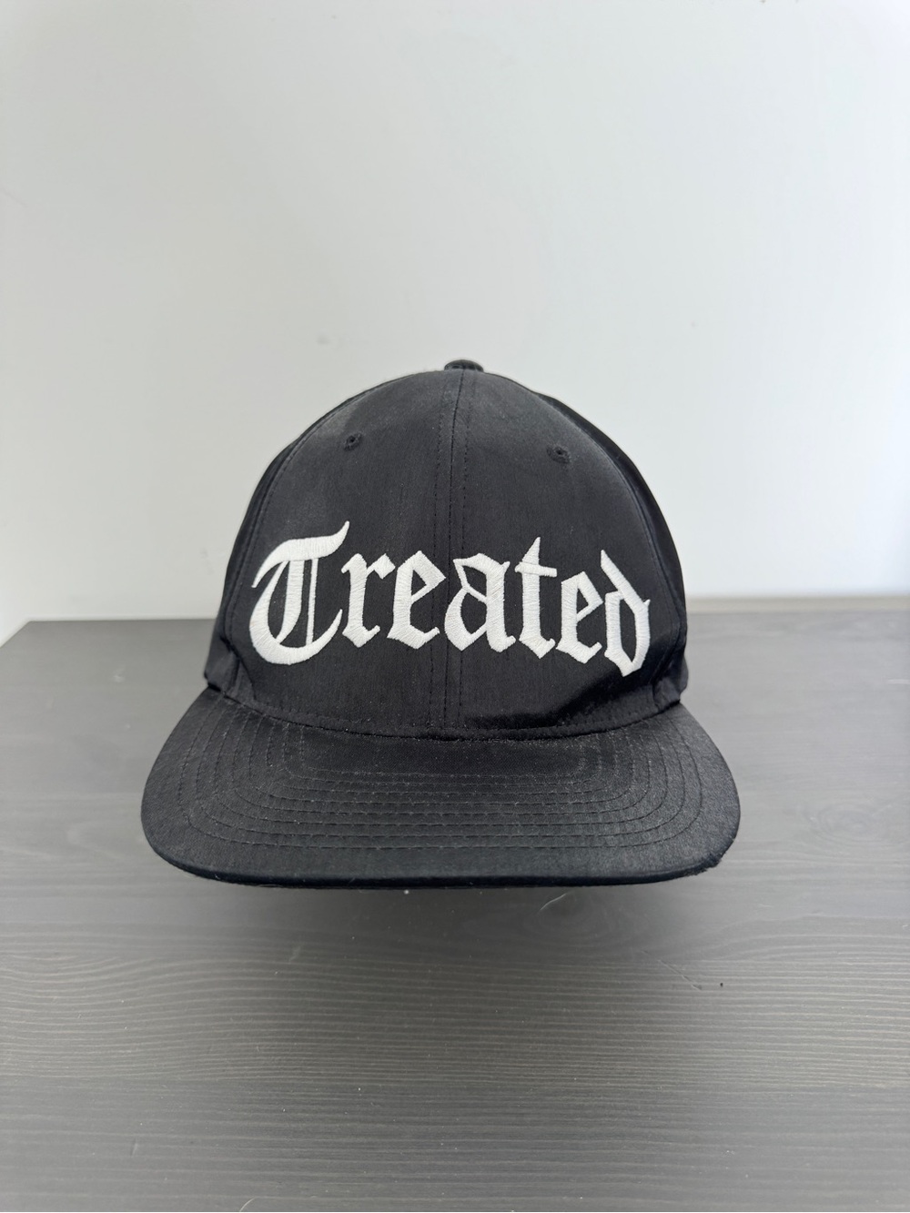 Black Baseball Cap with White "Treated" Embroidery - Chicago JUGRNAUT unisex